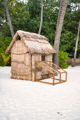 Typical Maldivian hut on the beach