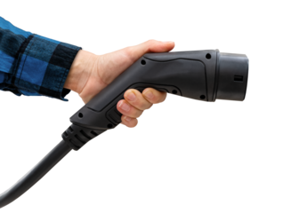 Isolated black EV charging plug in female hand in blue sleeve. Electric car charging connector.