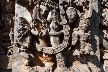 Hoysaleshwara temple carvings showcase intricate sculptures in Halebidu, Karnataka during daytime