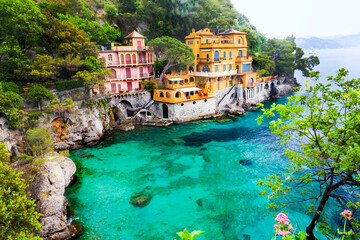 Portofino - iconic coastal town with colorful houses and symbol of luxury vacation. Italy travel and scenic places