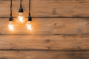 Three stylish pendant lights hang against a rustic wooden wall, creating a warm and inviting atmosphere.