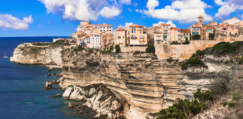 Corsica island, Bonifacio - beautiful coastal town in south.  Panoramic  view of houses hanging...