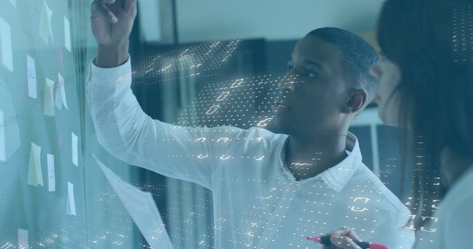 Image of financial data processing over diverse colleagues discussing work in office