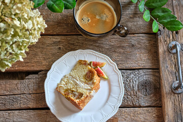 piece of Tall fig cake. Decorated with figs.