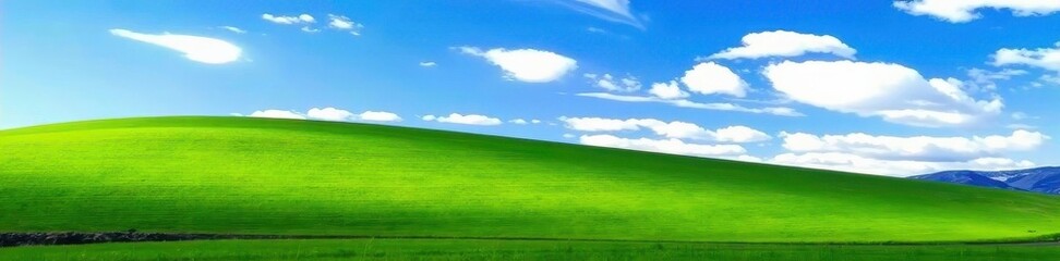 Rolling hills of emerald grass meet a boundless azure sky , photography, hills