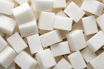 White sugar cubes background. Top view