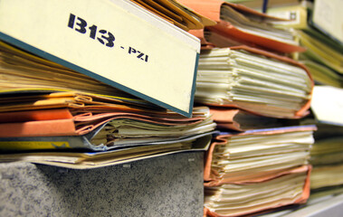 Stack of old files, documents, papers in the archive.