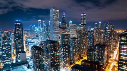 Naklejka premium Aerial Night View of Illuminated Cityscape with Skyscrapers