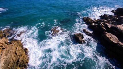 Waves crashing against rocky shoreline under bright blue sky captured at the coast revealing ocean's beauty : Generative AI