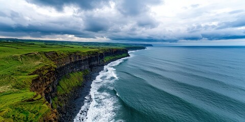 Fototapeta premium Rocky coastal cliffs with crashing waves, dramatic clouds rolling in over the vast ocean, breathtaking seascape