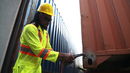 Technicians inspect container repairs by welding at container