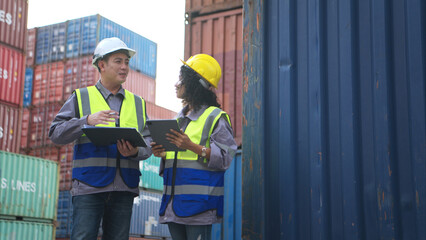 Engineers and technicians inspect the standards of containers that are made
