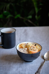 Oatmeal with apple slices and nuts
