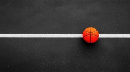 Orange Basketball on Black Court Surface with White Line