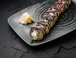 Delicious sushi roll with unique toppings on elegant plate