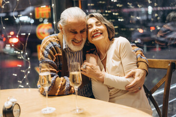 Elderly couple enjoying a romantic evening together