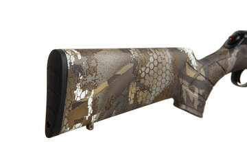 Stock of a rifle with a camouflage pattern, featuring a mix of brown, tan, and white colors with...