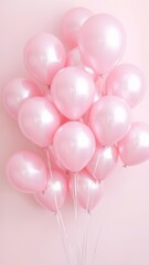  Light Pink Balloons with Shiny Metallic Finish Against a Soft Pastel Background