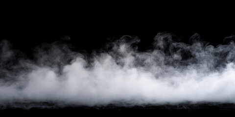 Fototapeta premium A black and white photo of smoke with a grayish color. The smoke is thick and long, and it seems to be coming from a fire. Scene is eerie and ominous