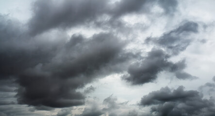 Storm cloud sky dark black background, cloudy rain heaven thunderstorm dramatic grey day.