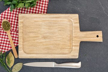 Background with ingredients for cooking and an empty cutting board. Ingredients for cooking.