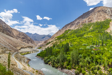 Beautiful landscape with mountains and the Drass River at Chanigound village in Kargil, Ladakh, India.