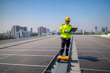 The technician Inspecting Solar Panels on a Factory Roof. An engineer wearing safety gear performing maintenance on solar panels installed on a factory rooftop, ensuring optimal energy efficiency.