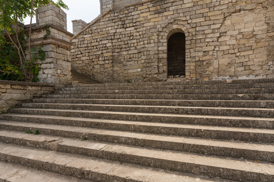 Mithridates Staircase in Kerch. Ancient stone steps lead to the top of Mount Mithridates, demonstrating historical architecture in the midst of nature.