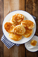 Homemade fluffy pancakes with honey