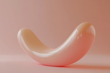 Fototapeta premium A Smooth Shiny Pink Object Isolated Against A Pink Backdrop