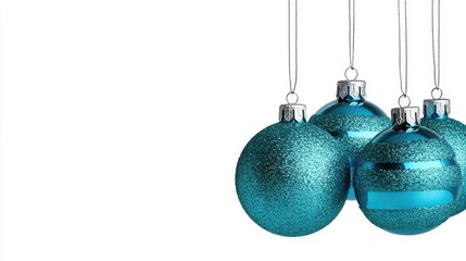 Shimmering Blue Christmas Ornaments Hanging on a White Background