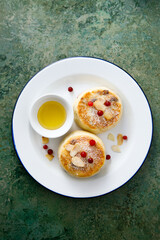 Homemade curd cakes with honey and almond