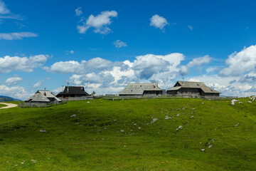 Velika Planina, Kamnik, Slovenia. Lord of the Rings style village. Wooden typical houses, hills,...