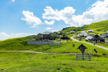 Velika Planina, Kamnik, Slovenia. Lord of the Rings style village. Wooden typical houses, hills,...