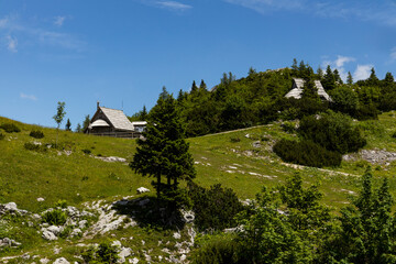 Velika Planina, Kamnik, Slovenia. Lord of the Rings style village. Wooden typical houses, hills,...