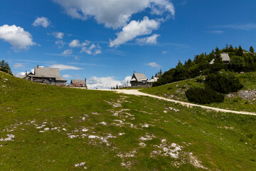 Velika Planina, Kamnik, Slovenia. Lord of the Rings style village. Wooden typical houses, hills,...