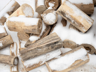 A bunch of round logs. Harvested wood for construction or heating.
