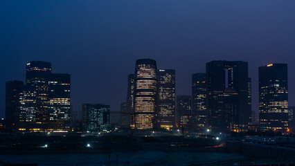 The Lize SOHO building, an urban landmark in Beijing, China, under the night sky