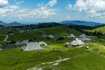 Velika Planina, Kamnik, Slovenia. Lord of the Rings style village. Wooden typical houses, hills,...