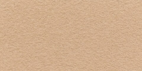 A smooth, light brown textured background with subtle variations, resembling natural paper or cardboard.