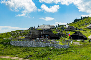 Velika Planina, Kamnik, Slovenia. Lord of the Rings style village. Wooden typical houses, hills,...