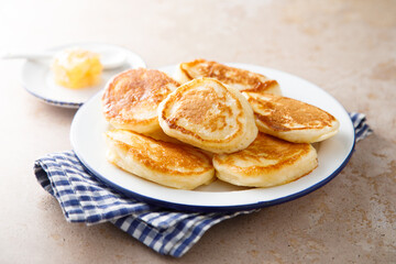 Homemade fluffy pancakes with honey