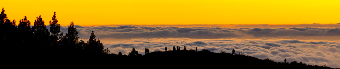Fototapeta premium a sundown over the clouds panorama
