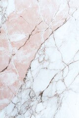 Close-up of pink and gray marble with a luxurious texture on a countertop or tabletop.