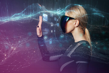 Woman using VR glasses interacting with a digital interface