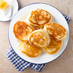 Homemade fluffy pancakes with honey