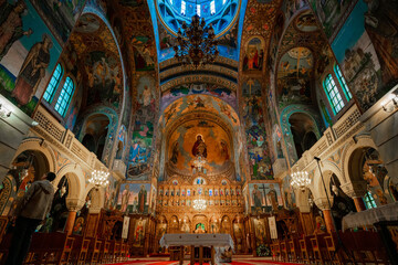 Obraz premium Baptism Ceremony in Church – Christening Font with Plush Bear and Religious Icons