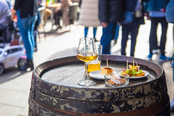 Drink served in a barrel on a street bar terrace