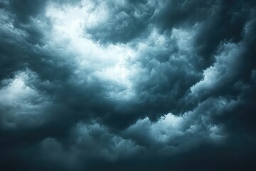 Obraz premium Dramatic storm clouds gathering in the sky, hinting at an impending rainstorm and atmospheric tension