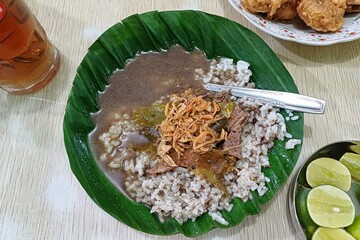 Nasi Pindang Kudus, Indonesian traditional beef black soup.
